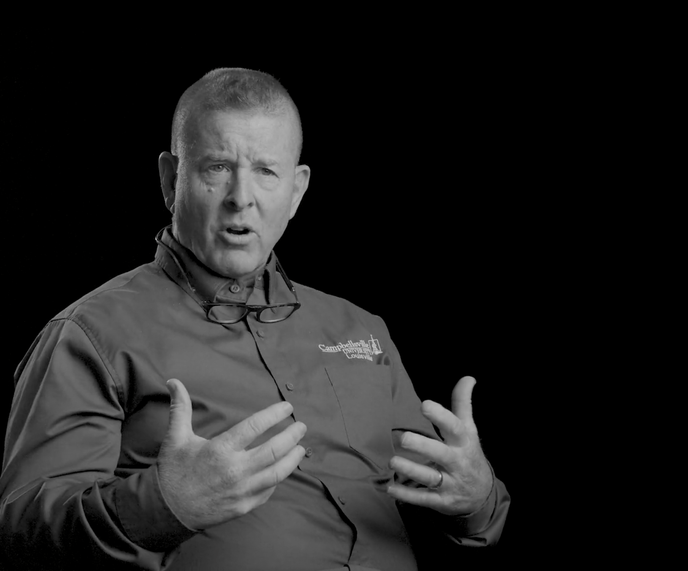 black and white photo of AMSR expert speaking