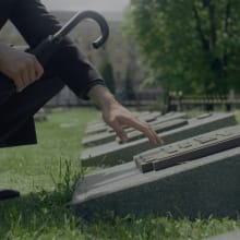 man at a cemetery