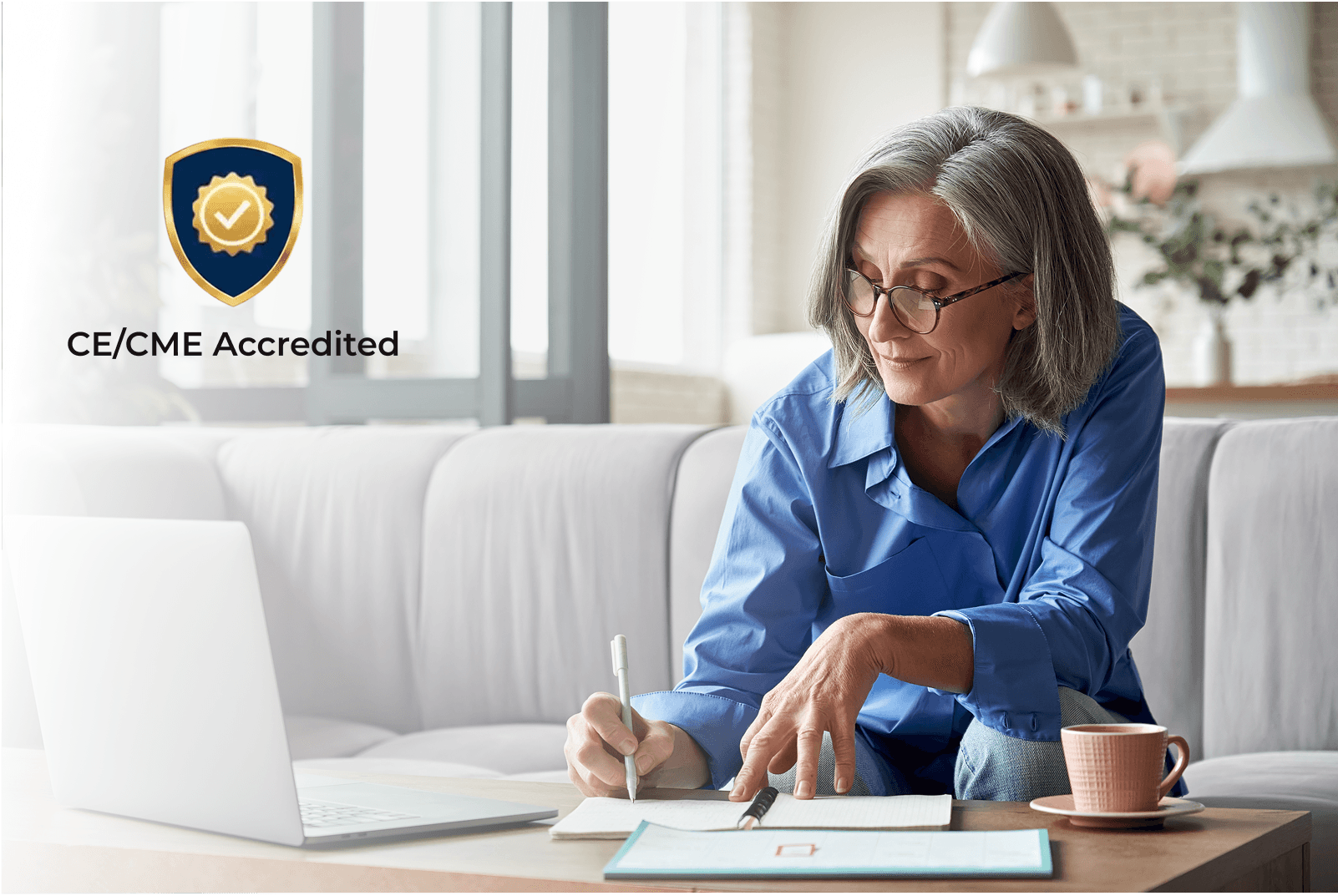 Woman at computer with CE Accreditation badge