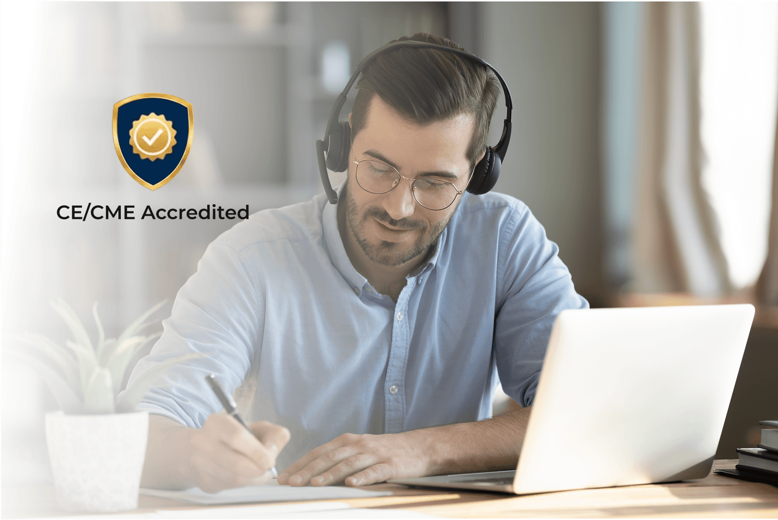 Man at a computer with a CE Badge